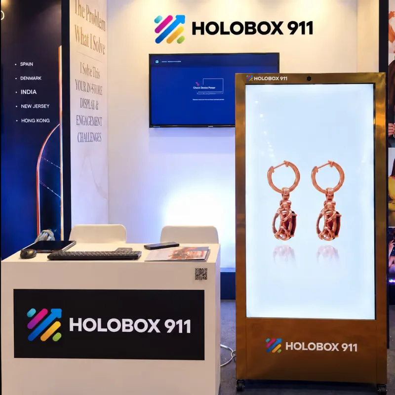 HoloBox911 stand with a display showing rose gold earrings at COUTURE INDIA 2026, New Delhi