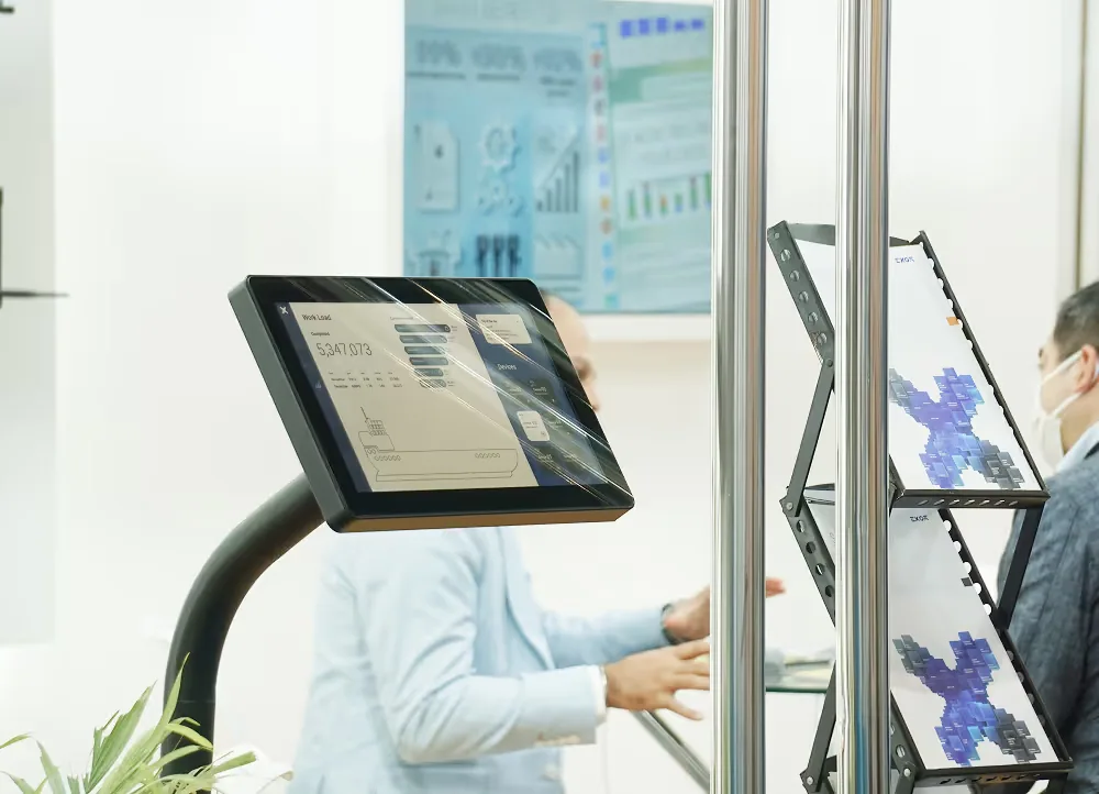 Tablet mounted on an articulated arm stand running the Sales Enablement App offline in an office or lab setting, demonstrating multi-device readiness