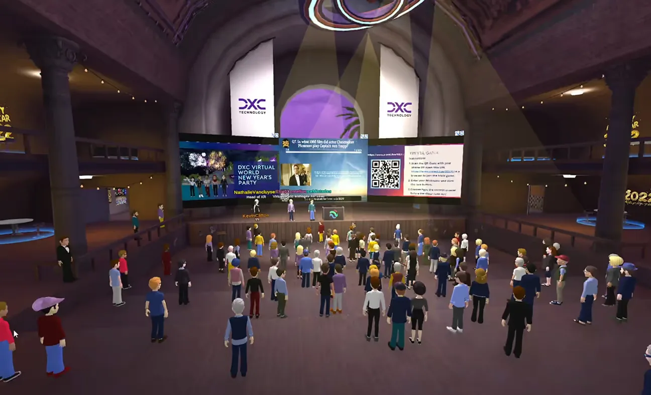 Virtual event hall showing avatars attending a company gathering on a stage with large screens and spotlights, illustrating Virtual HQ & 3D Walkthroughs.